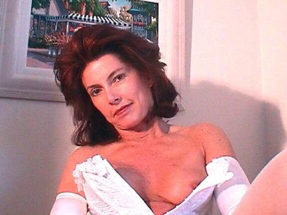 Mature in white corset