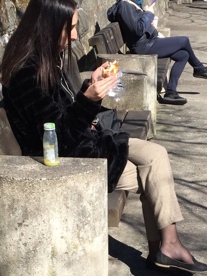 Girl showing some parts of her nice black hosed legs &amp; feet