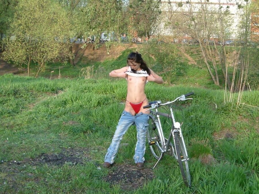 Brunette walks naked at public