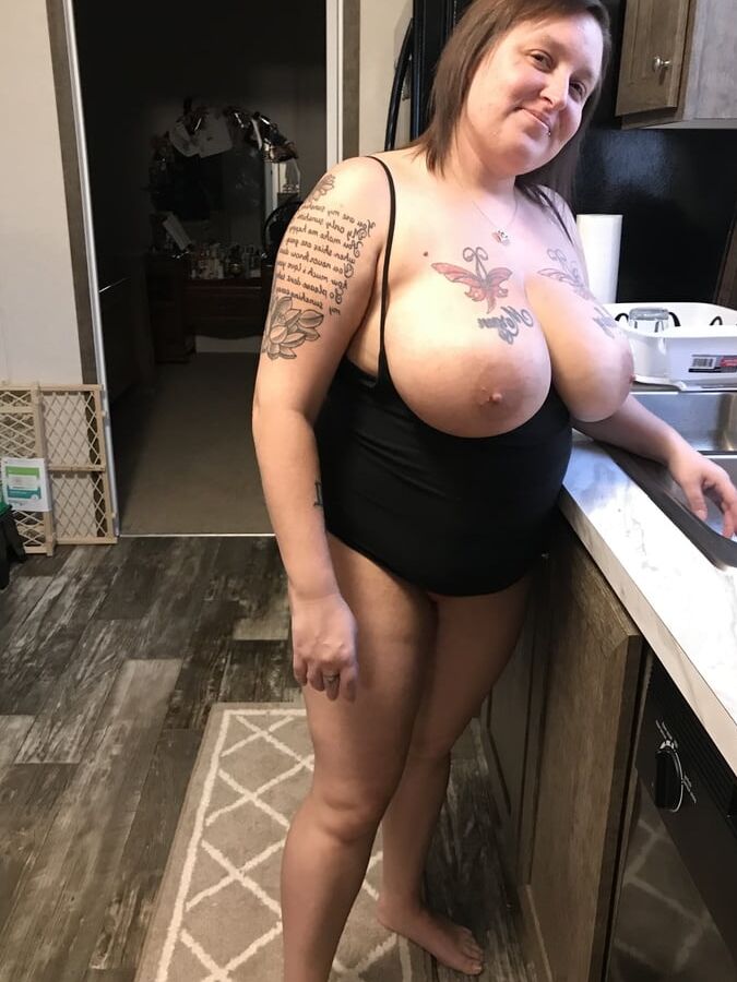 Huge natural tits walking through house naked