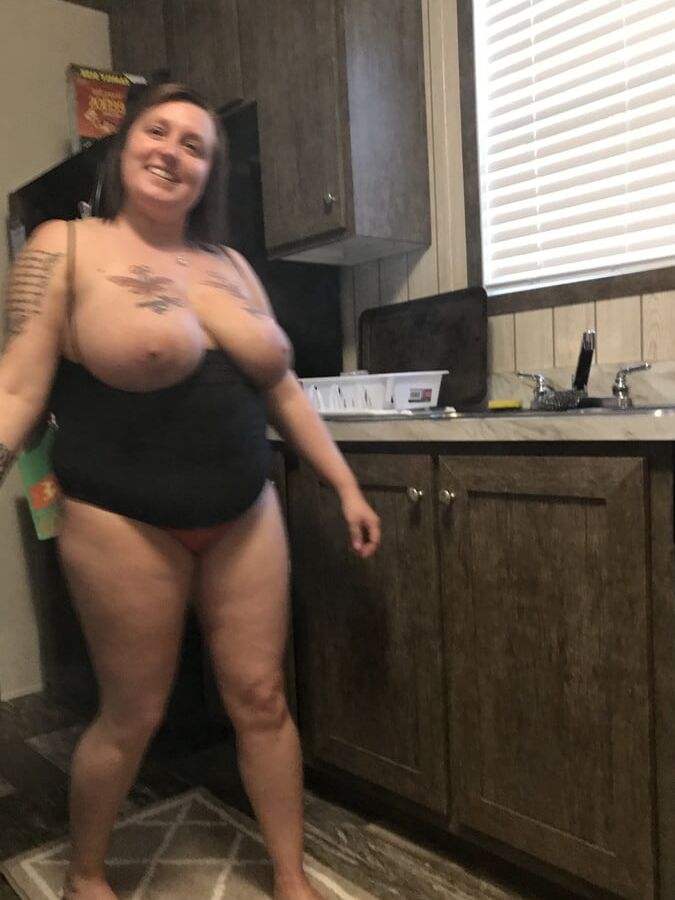 Huge natural tits walking through house naked