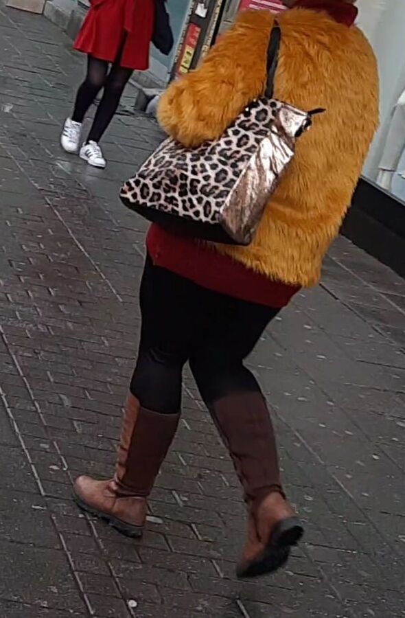 Big butt in boots and leggings