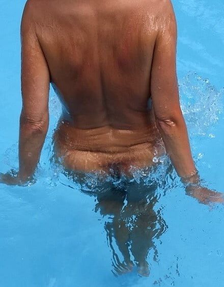 matures nude in the pool