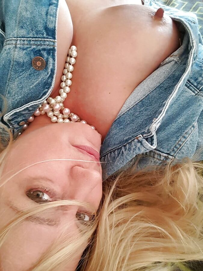 Big tits blonde milf loves to pose