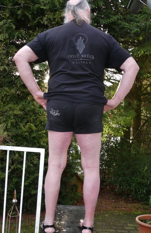 Traditional shorts barefoot in plastic sandals