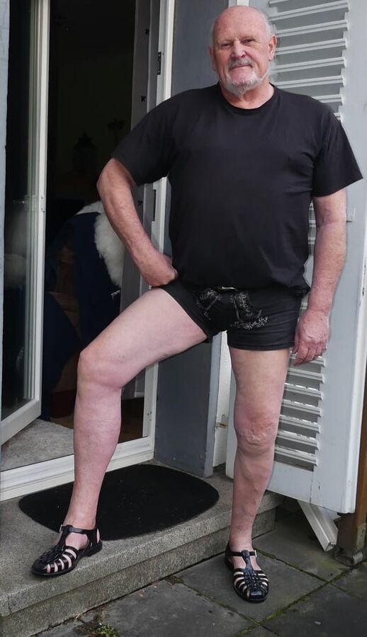 Traditional shorts barefoot in plastic sandals