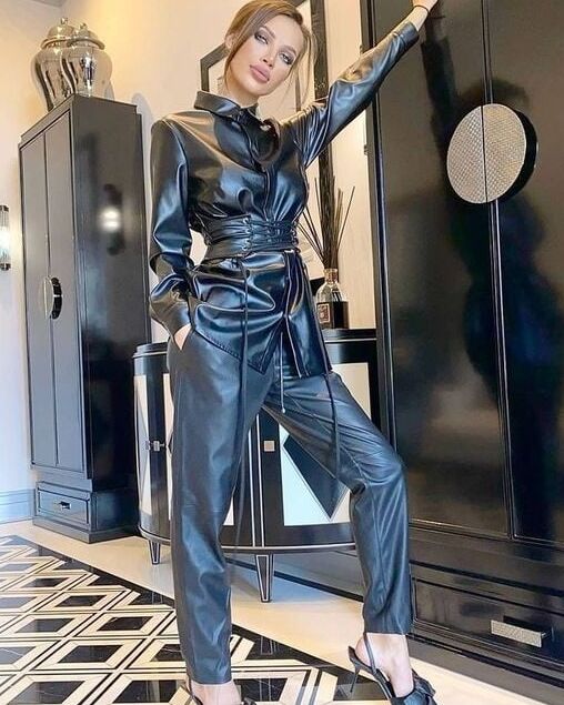 Woman completely in leather - by Redbull
