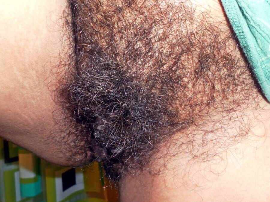 Aunty Pissy Wets Her Pussy Hairs