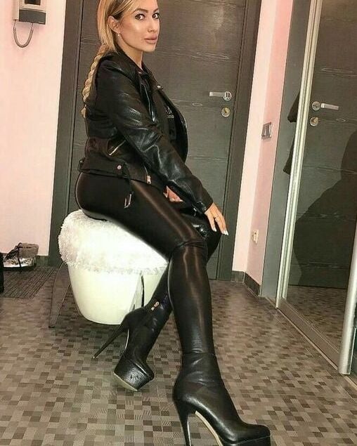 Woman completely in leather - by Redbull
