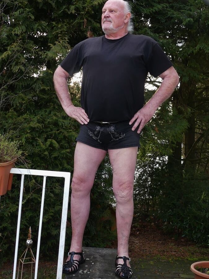 Traditional shorts barefoot in plastic sandals