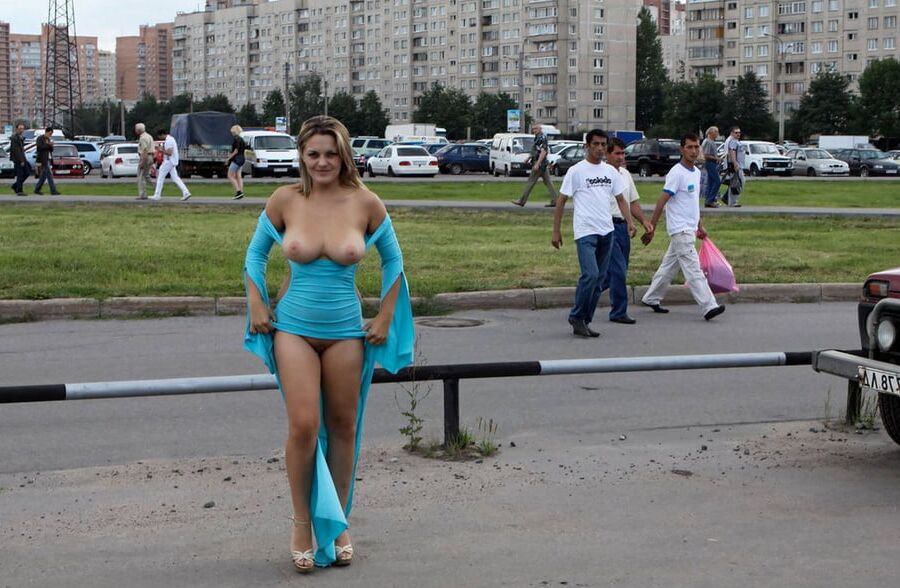 Smiling hot busty blonde private nude at public streets