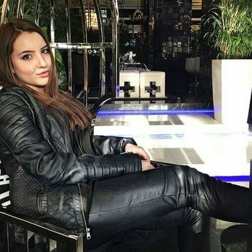 Woman completely in leather - by Redbull