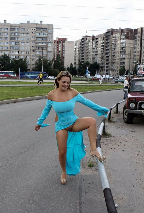 Smiling hot busty blonde private nude at public streets