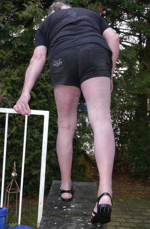 Traditional shorts barefoot in plastic sandals