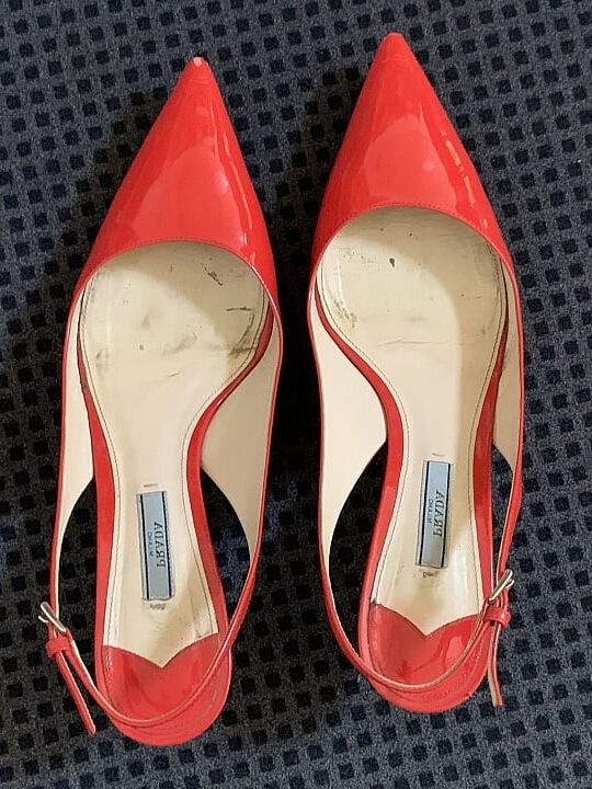 patent leather slingbacks by Prada