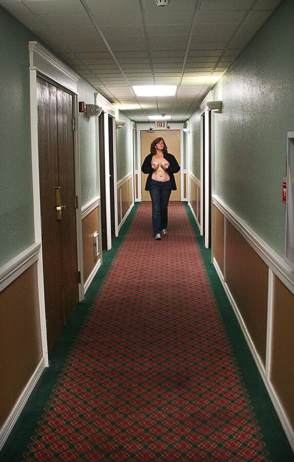 . Redhead wife poses for hubby