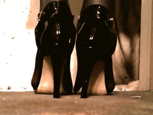 patent leather slingbacks by Prada