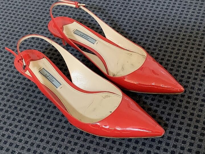 patent leather slingbacks by Prada