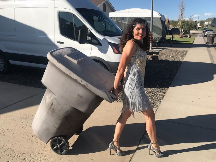 DRESSED UP TAKING TRASH OUT