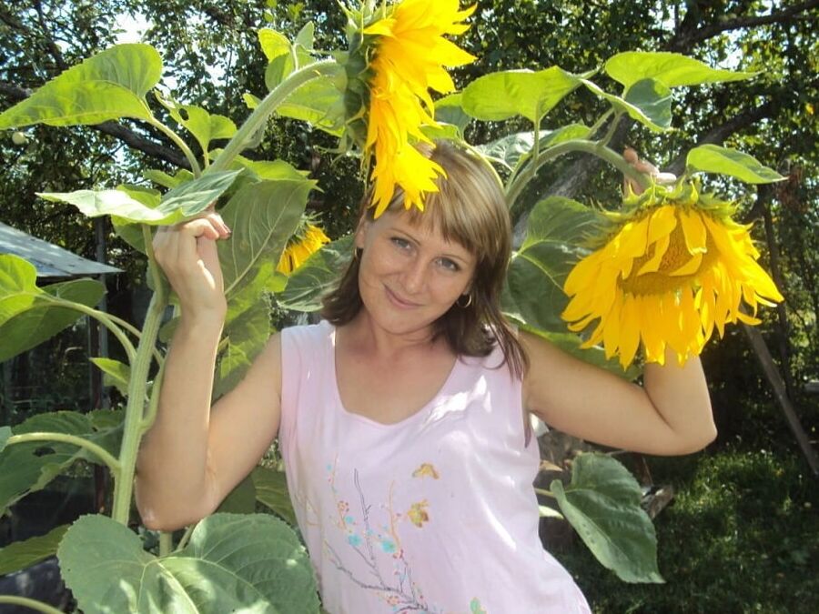 Woman and Sunflowers