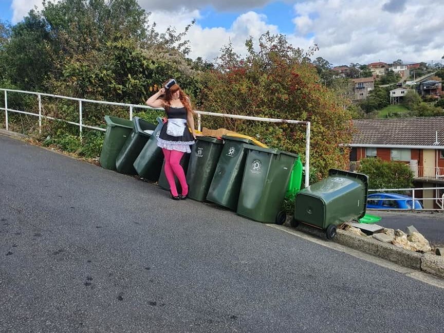 DRESSED UP TAKING TRASH OUT