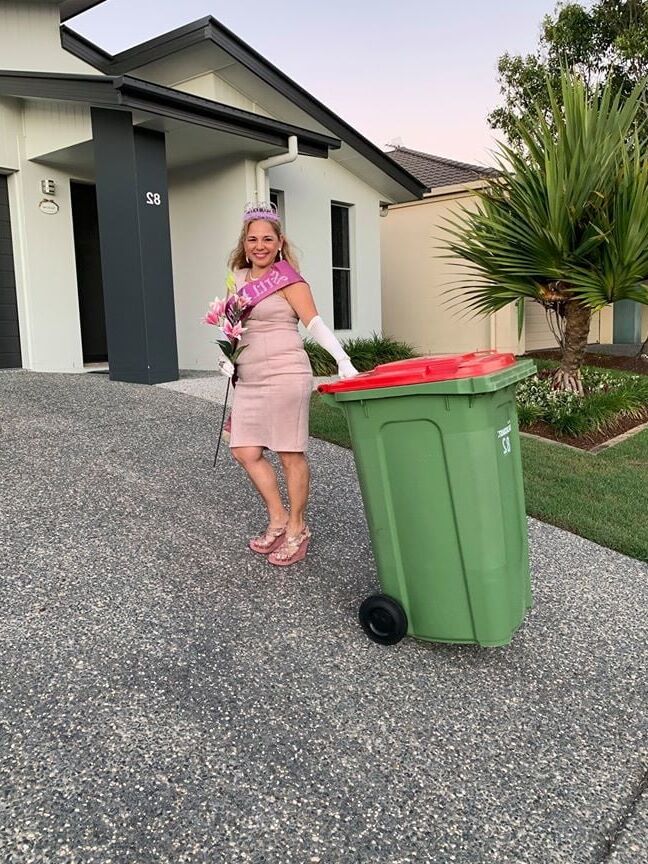 DRESSED UP TAKING TRASH OUT