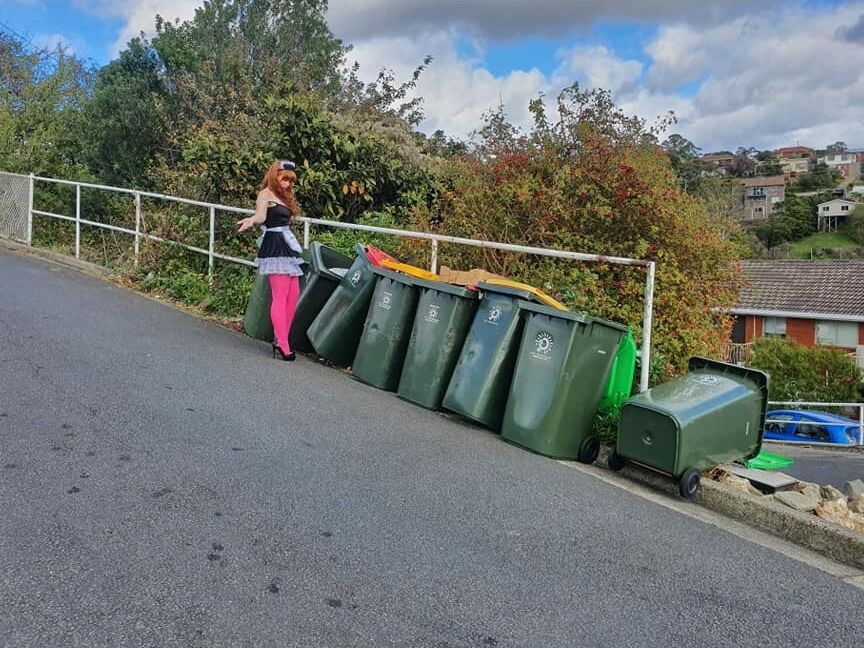 DRESSED UP TAKING TRASH OUT