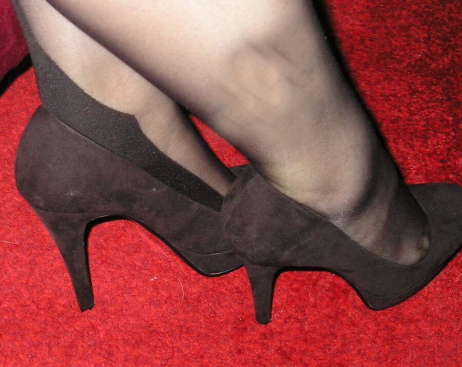 My girlfriend wearing black seamed tights pantyhose