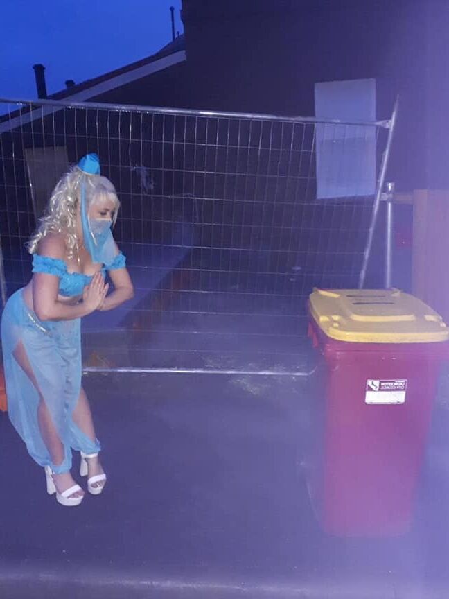 DRESSED UP TAKING TRASH OUT