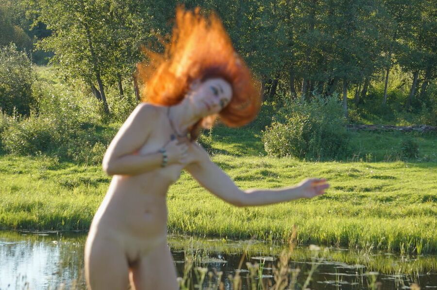 Flame Hair naked upon river