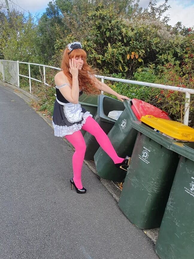 DRESSED UP TAKING TRASH OUT