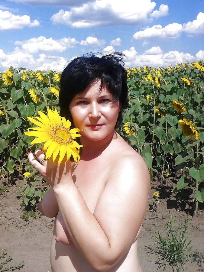 Woman and Sunflowers
