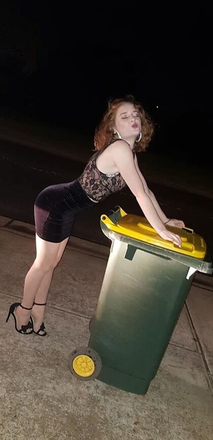 DRESSED UP TAKING TRASH OUT