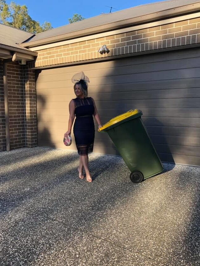 DRESSED UP TAKING TRASH OUT