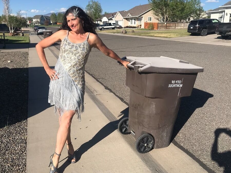 DRESSED UP TAKING TRASH OUT