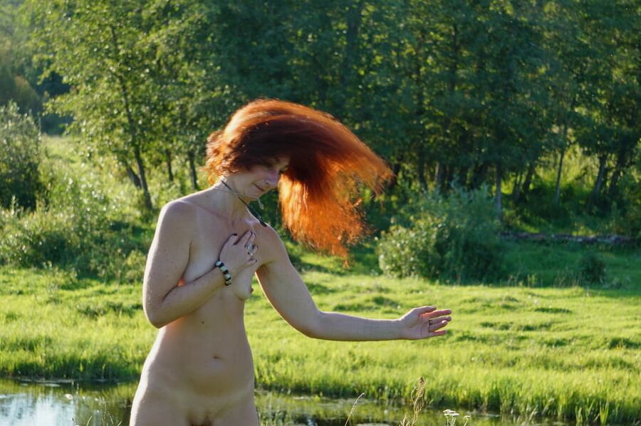 Flame Hair naked upon river