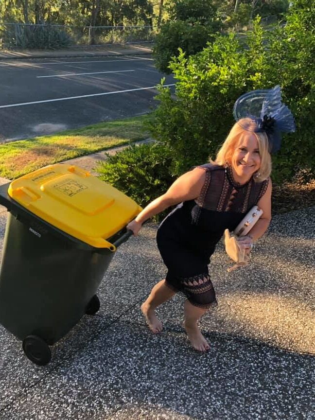 DRESSED UP TAKING TRASH OUT