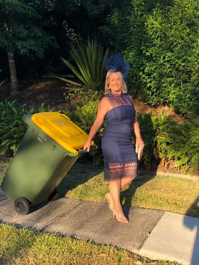 DRESSED UP TAKING TRASH OUT