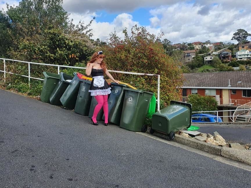DRESSED UP TAKING TRASH OUT
