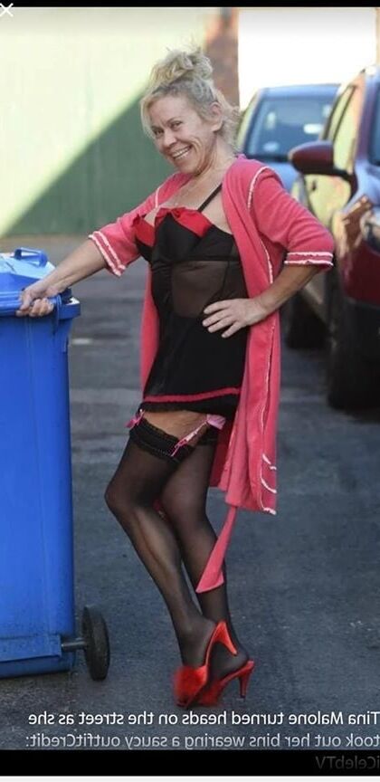 DRESSED UP TAKING TRASH OUT