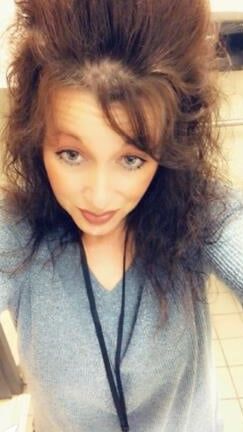 Sexy Milf With Big Hair.