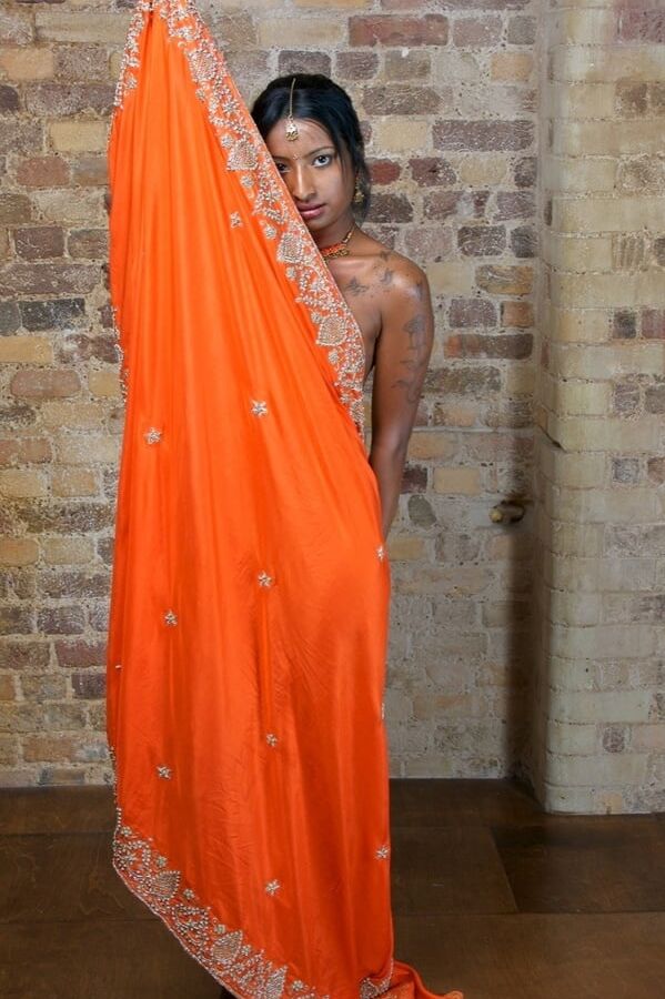 Asha stripping her saree