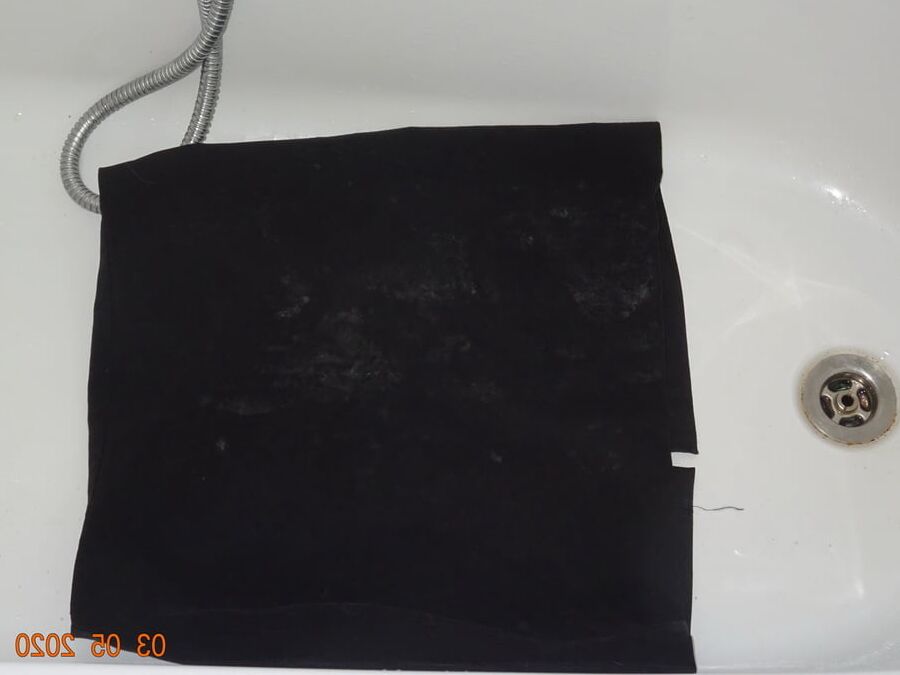 piss on black skirt