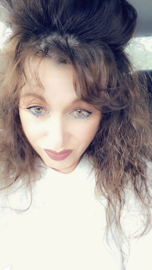 Sexy Milf With Big Hair.