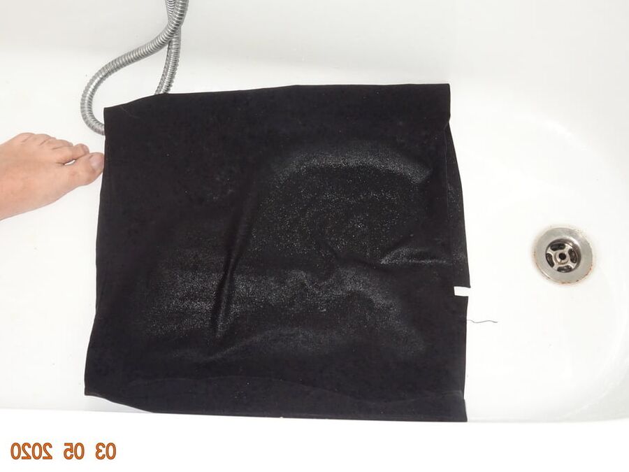 piss on black skirt
