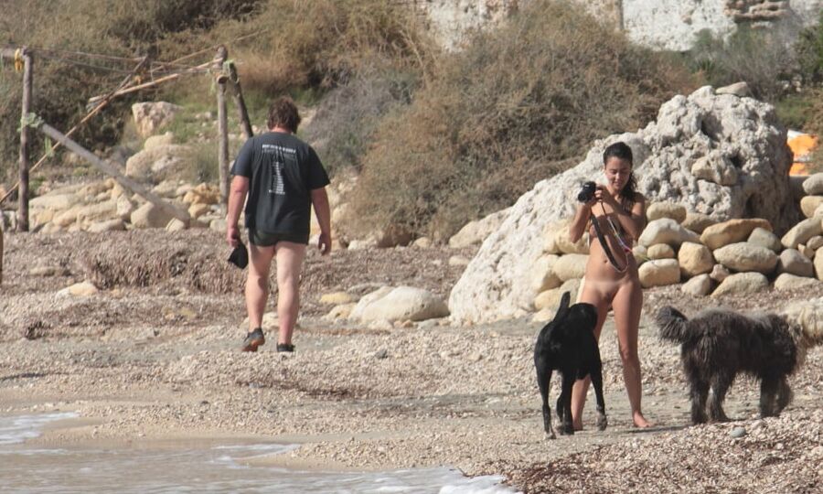 Tattooed Nudist Beach Slut with Dogs CMNF OON