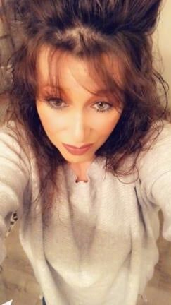 Sexy Milf With Big Hair.