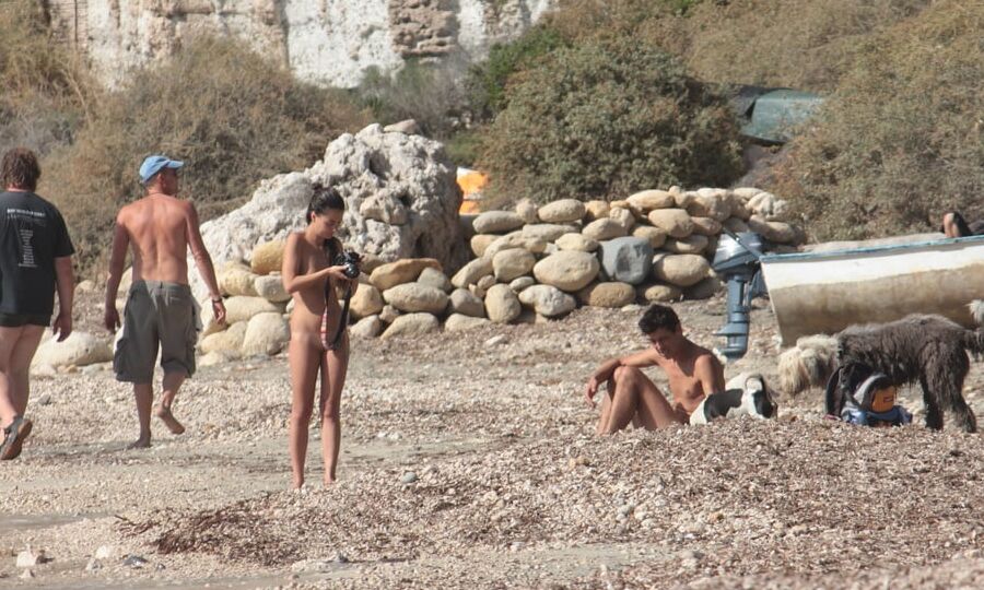 Tattooed Nudist Beach Slut with Dogs CMNF OON