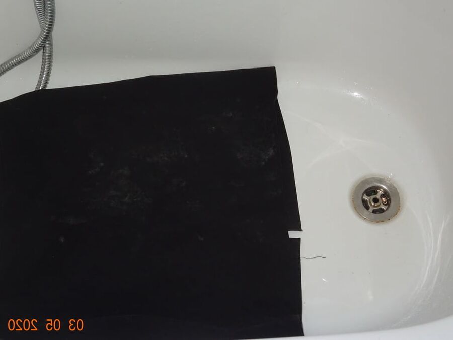 piss on black skirt