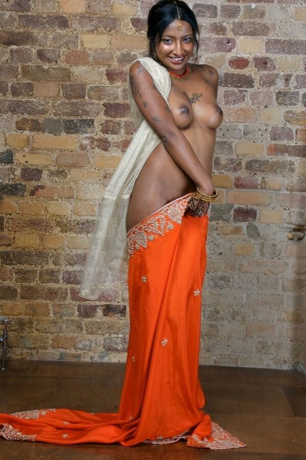 Asha stripping her saree